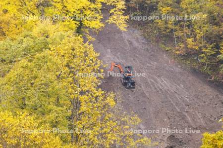 高所法面掘削作業